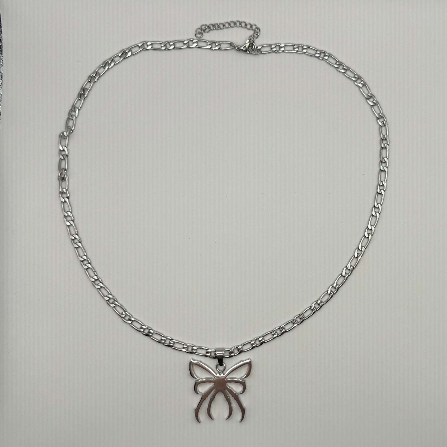 spider bow necklace